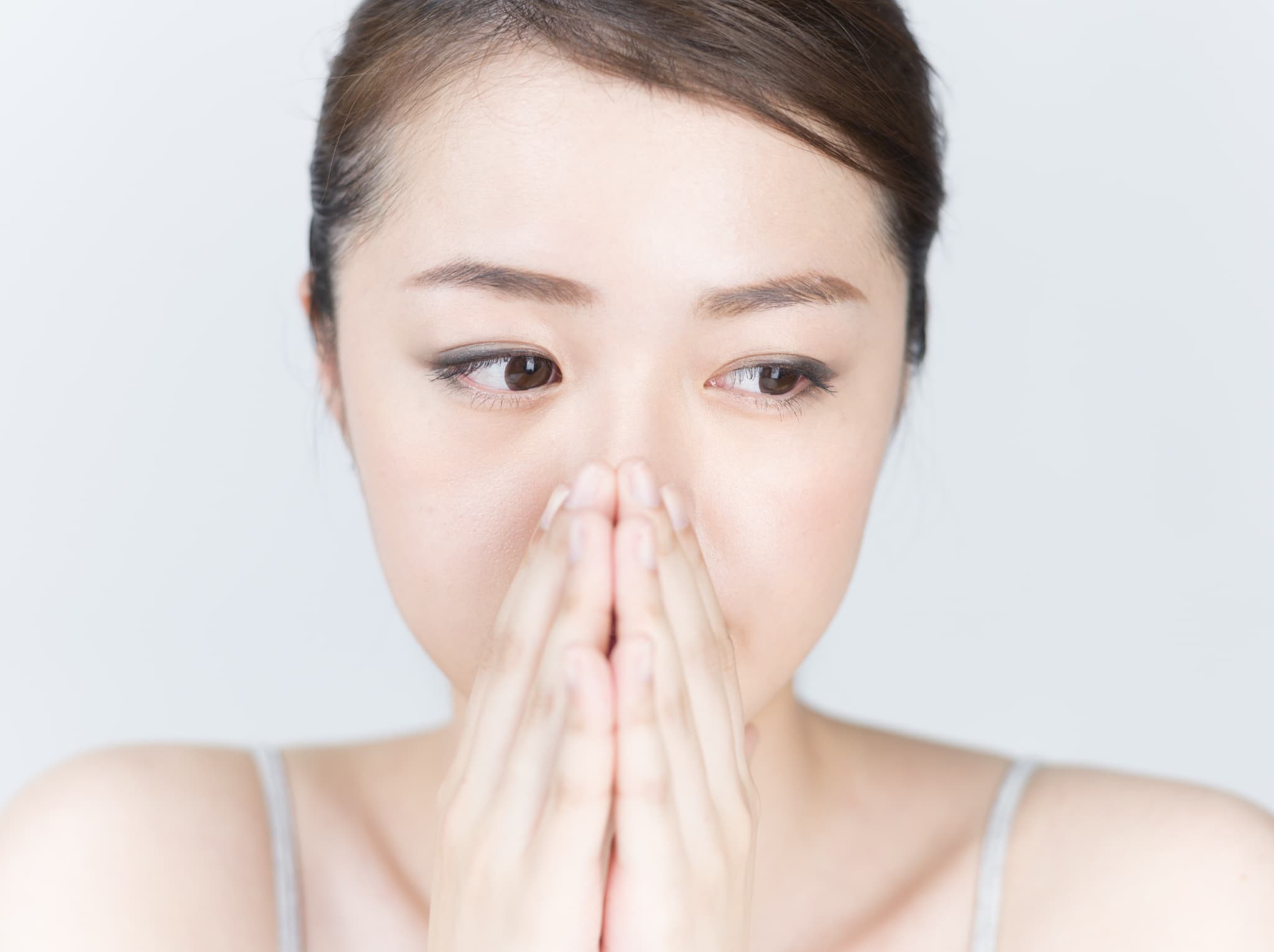 歯周病の進行で口臭が気になる女性